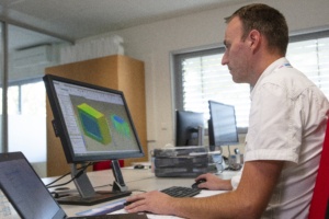 man at a computer doing CAD
